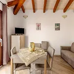 Air-conditioned Penthouse With Terrace And Parking Badesi